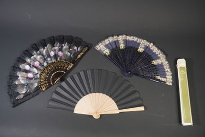 three different types of fan on a table next to a ruler