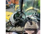 a view of the driver ' s seat of a construction vehicle