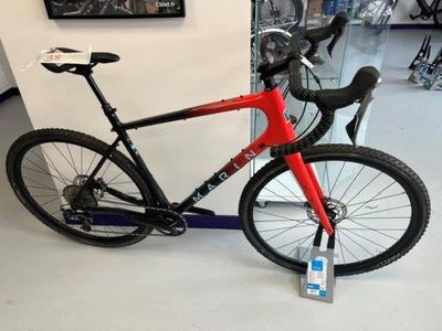 a bike that is sitting on the floor in a store