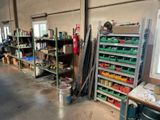 a room with a lot of tools on the shelves