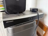 a black suitcase sitting on top of a silver dishwasher