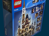 a box of legos with a castle inside of it
