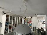 a mirror ball hanging from the ceiling in a room