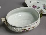 a bowl and a plate sitting on a table