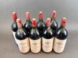 six bottles of red wine are lined up in a row