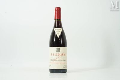 a bottle of wine that is sitting on a table