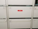 a lot of filing cabinets that are stacked together