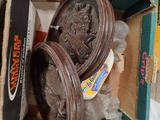 a box full of assorted items sitting on the floor