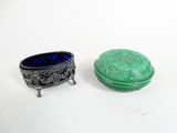 pair of green and blue glass dishes on stand