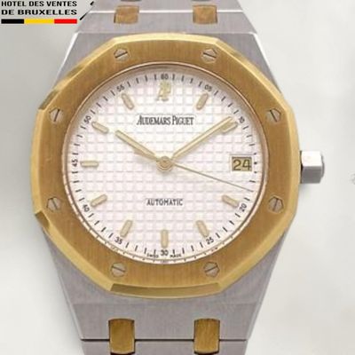 an image of a close up of a watch on a white surface