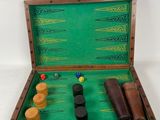 an image of a wooden backgam board with several pieces of wood in it