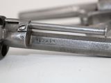 two revolvers that are sitting on a table
