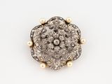 an antique diamond and pearl broochle