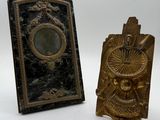 pair of antique brass bookends of a man and a woman