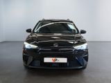 a picture of a black toyota camry in a showroom