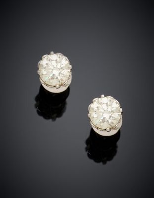 a pair of diamond earrings