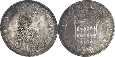 a close up of two silver coins on a white background