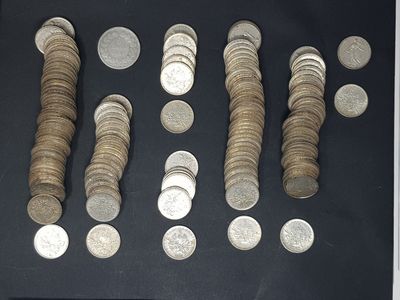 a lot of coins that are sitting on a table