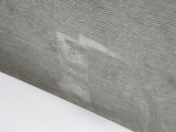 a close up of a window screen with water stains on it