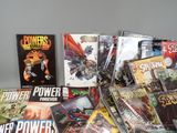 a lot of comic books sitting on a table