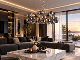 un salon avec un canapé, une table basse, des chaises et une grande fenêtre