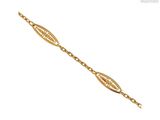 a yellow gold bracelet with an oval link