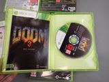 a person holding a green case with a video game on it