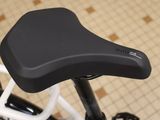 a close up of a bicycle with a seat on it