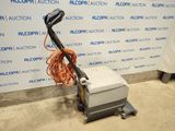 an image of a floor scruber in a room