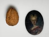 a picture of a walnut and a picture of a woman
