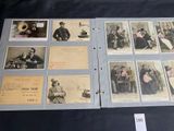 several old photos of people are displayed on a table