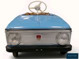 a blue toy car with a steering on top of it