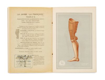 an open book with a drawing of a human leg and a picture of a plant