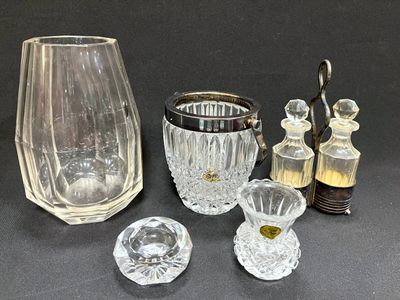 a lot of glass items that are on a table