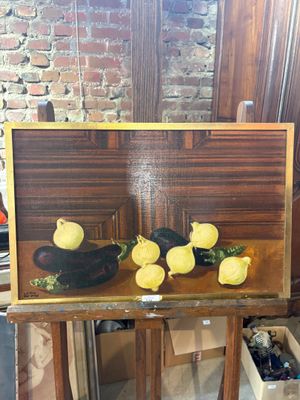 a picture of a painting of lemons and peppers on a table