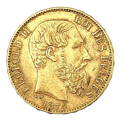une pièce d'or sur laquelle est représenté le visage d'un homme