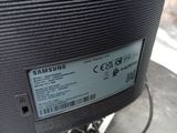 a close up of a computer monitor with a keyboard and mouse