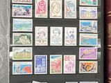 a picture of a collection of stamps and a book
