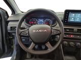 the interior of a car with a steering wheel and dashboard controls