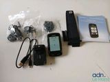 the contents of a cell phone, charger, and charger are laid out on a table