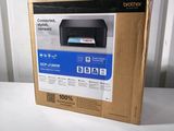 an open box of a printer sitting on top of a table