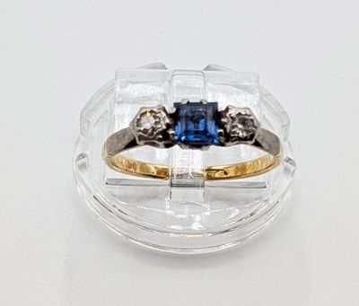 an image of a blue sapphire and diamond ring