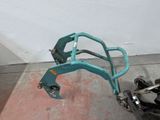 a small blue machine that is sitting on the ground