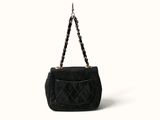 black quilted purse with chain strap and chain closure