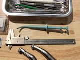 many different tools that are sitting on a table