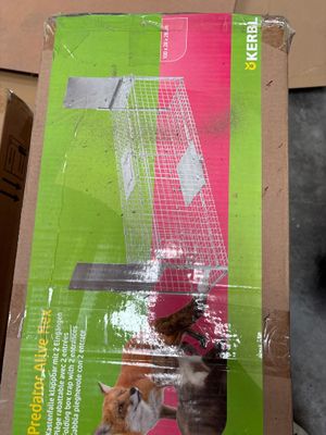 a cardboard box with a picture of a cat inside of it