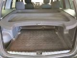 a trunk of a car with a large tray in the back