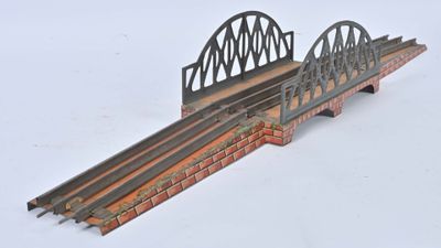 a model of a bridge with a train going over it