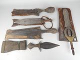a lot of old tools that are laying out on the table