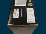 a black box with a red and white label on it